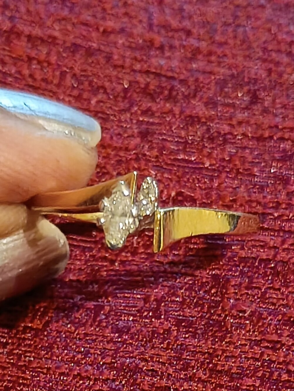14K solid yellow gold marquise-cut diamond engagement ring.